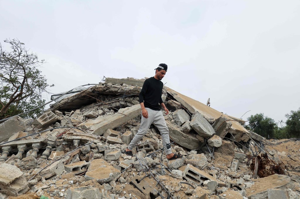The rubble of a house destroyed by an Israeli air strike in Khan Yunis. Photo: AFP