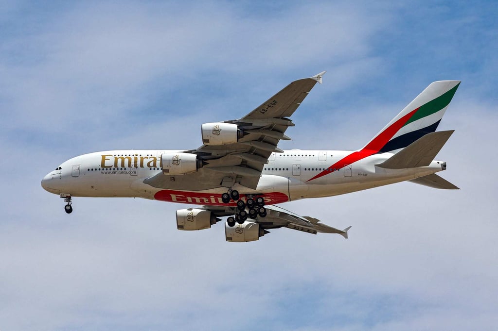 An Emirates Airbus A380 comes in to land at Dubai International Airport. The world’s largest long-haul airline has restored 85 per cent of its pre-pandemic flights to China. Photo: AFP
