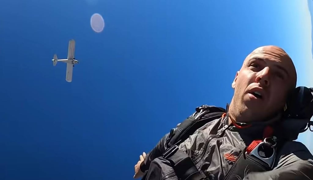 Already wearing a parachute, Trevor Jacob jumped out with a selfie stick camera in hand. Photo: YouTube / TrevorJacob