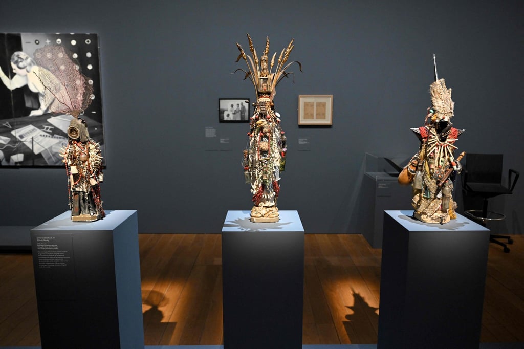The artworks “Gypsy warriors I, II, VII” by Kalman Varady are seen at the exhibition. Photo: AFP