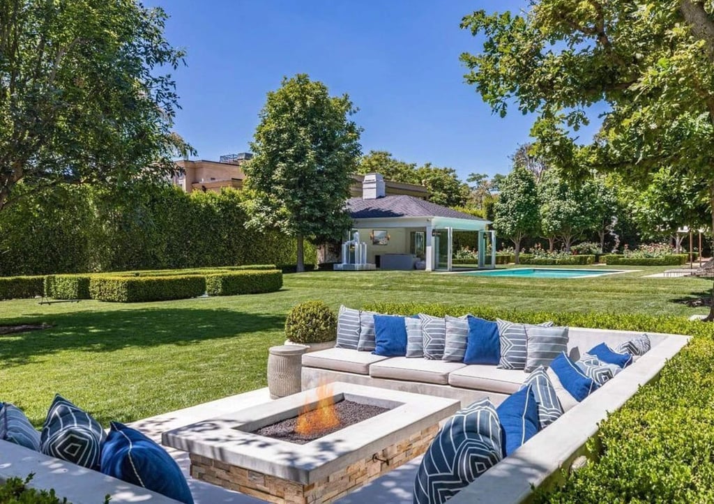 The backyard features an outdoor fireplace – perfect for hanging out with friends after dinners. Photo: Simon Berlyn The backyard features an outdoor fireplace – perfect for hanging out with friends after dinners. Photo: Simon Berlyn