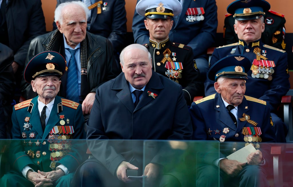 Belarusian President Alexander Lukashenko (centre) watches the Victory Day military parade in Moscow on May 9. Photo: AP Belarusian President Alexander Lukashenko (centre) watches the Victory Day military parade in Moscow on May 9. Photo: AP