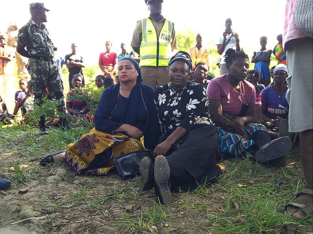 Malawi’s Minister of Water and Sanitation Abida Mia (left) waits with local Member of Parliament Gladys Ganda, for updates from the rescue party on the banks of Shire River on Tuesday. Photo: AP