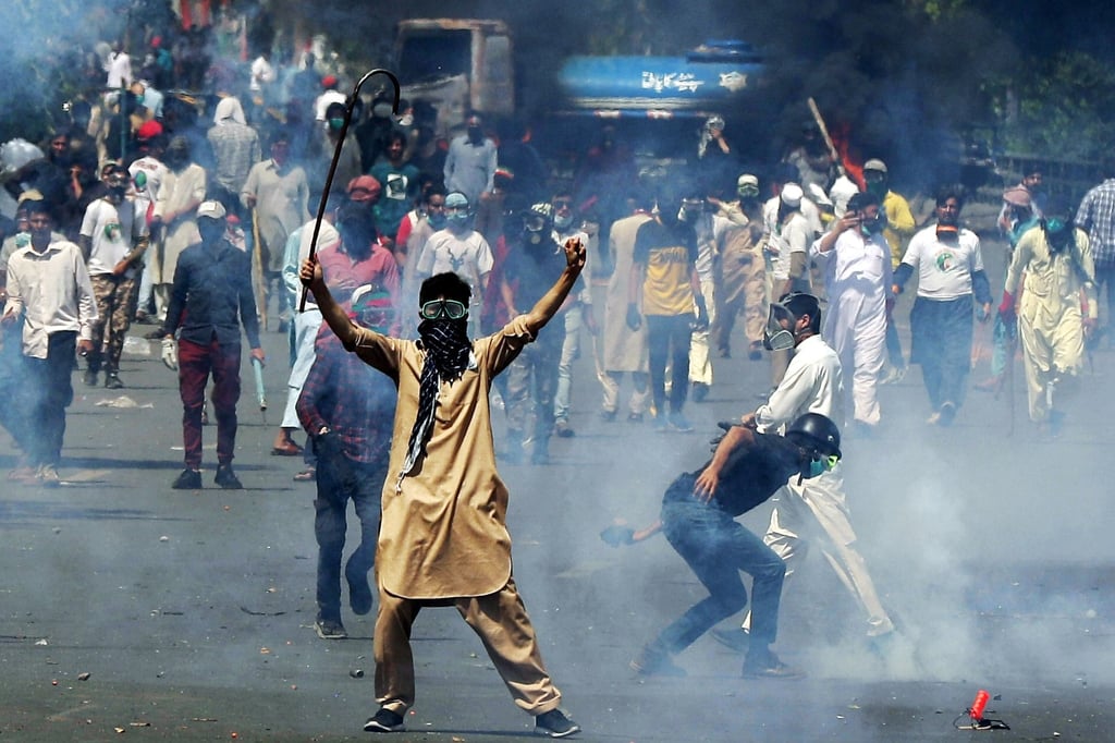 Supporters of Pakistan’s former prime minister Imran Khan clash with security forces amid violent protests against his arrest this month. The South Asian nation’s population is set to overtake Indonesia’s within the coming decades. Photo: EPA-EFE Supporters of Pakistan’s former prime minister Imran Khan clash with security forces amid violent protests against his arrest this month. The South Asian nation’s population is set to overtake Indonesia’s within the coming decades. Photo: EPA-EFE
