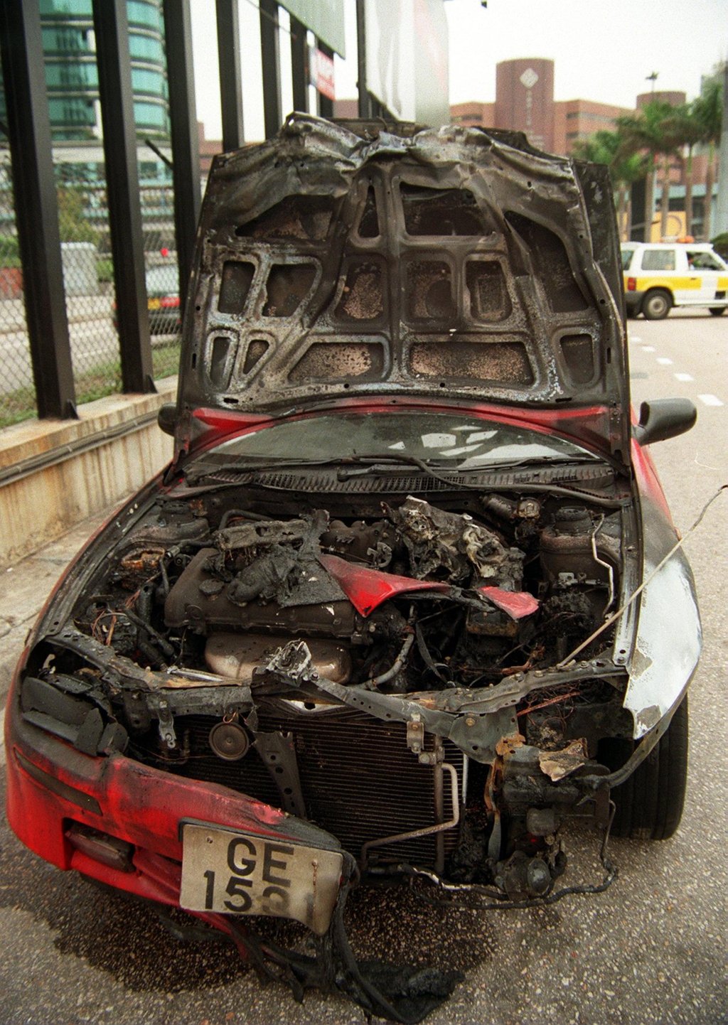 The wreckage of the car which caught fire in the Cross-Harbour Tunnel. Photo: Oliver Tsang The wreckage of the car which caught fire in the Cross-Harbour Tunnel. Photo: Oliver Tsang