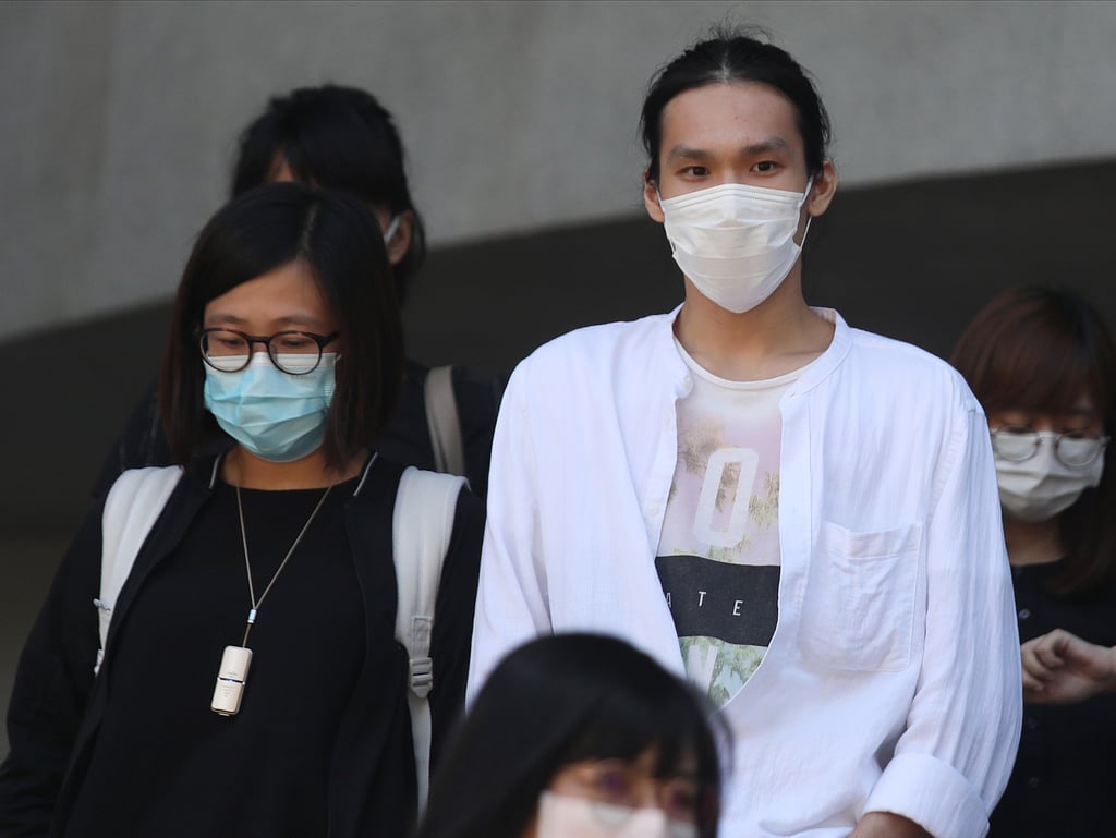 Kan Tsz-pan, 24, appears at Kowloon City Court in Ma Tau Wai. Photo: Xiaomei Chen