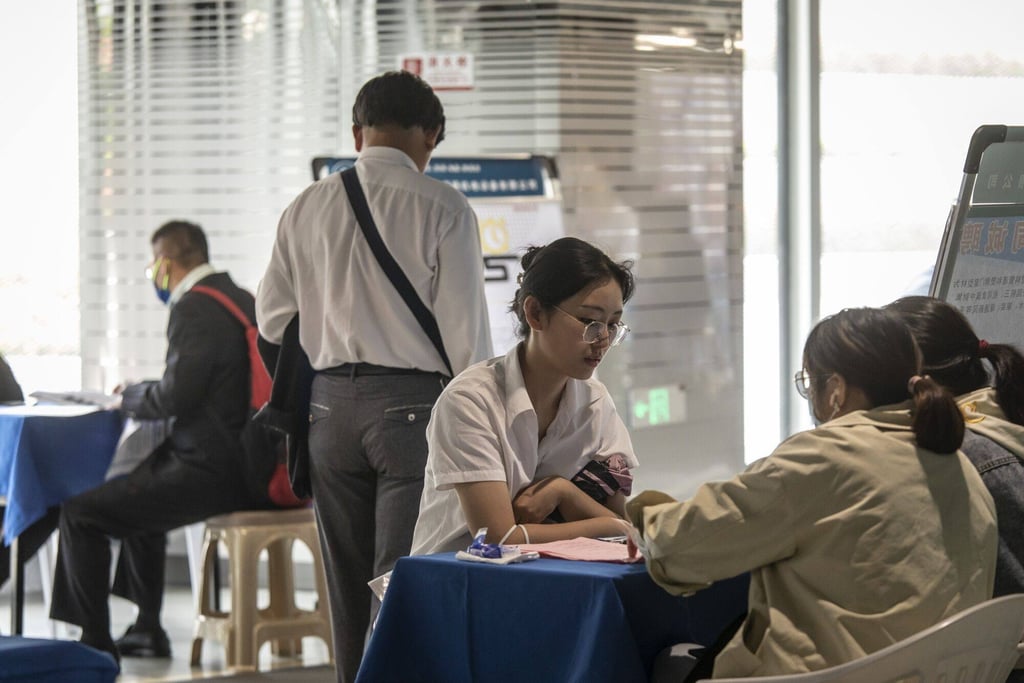 Attendees at a job fair in Shanghai in May 2023. Photo: Bloomberg Attendees at a job fair in Shanghai in May 2023. Photo: Bloomberg