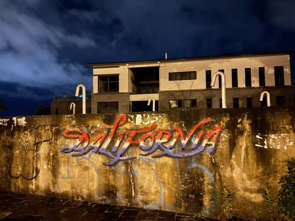 Graffiti painting of the word “Dalifornia” in Dali, China. Photo: John Wang Graffiti painting of the word “Dalifornia” in Dali, China. Photo: John Wang