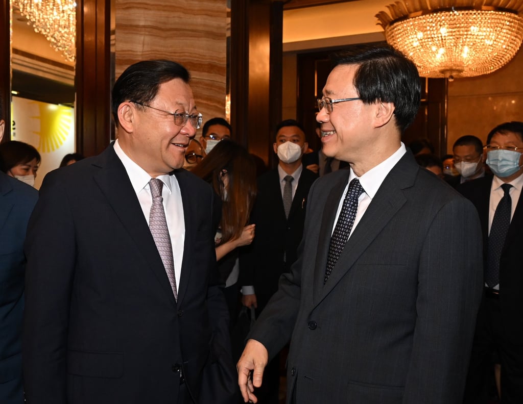 Hong Kong Chief Executive John Lee (right) and Wang Weizhong, the governor of Guangdong province, attend the opening ceremony of the SmartHK forum, part of the Hong Kong-Guangdong Cooperation Week, on Wednesday. Photo: Handout Hong Kong Chief Executive John Lee (right) and Wang Weizhong, the governor of Guangdong province, attend the opening ceremony of the SmartHK forum, part of the Hong Kong-Guangdong Cooperation Week, on Wednesday. Photo: Handout