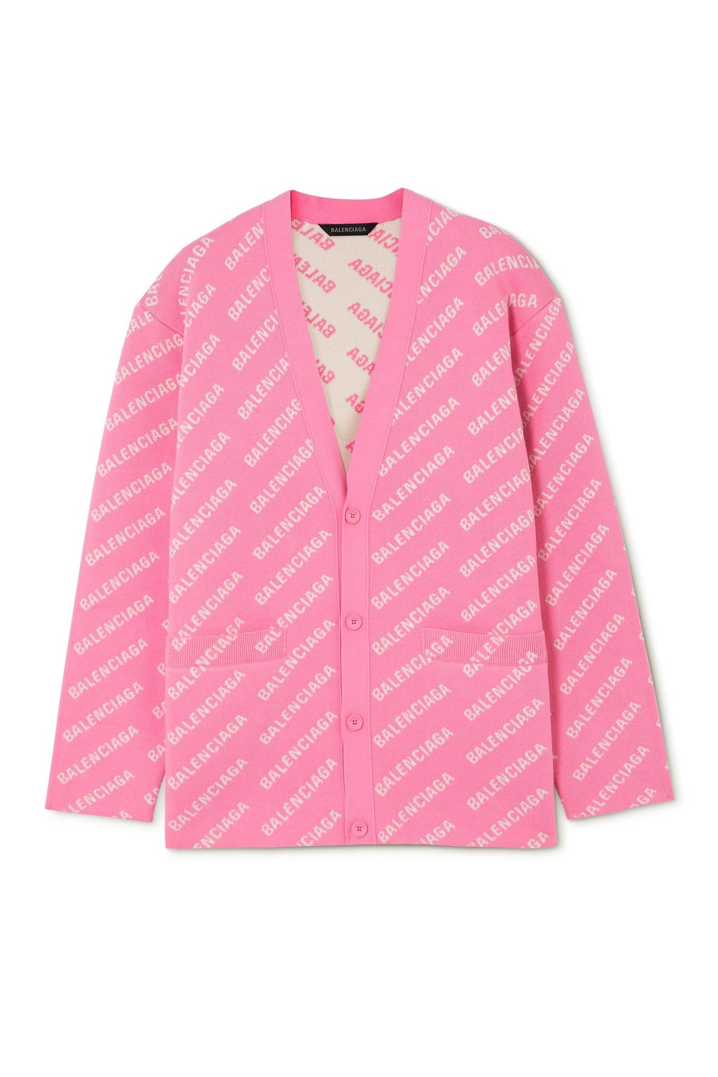 A Barbiecore-pink cardigan by Balenciaga at Net-a-Porter. Photo: Handout
