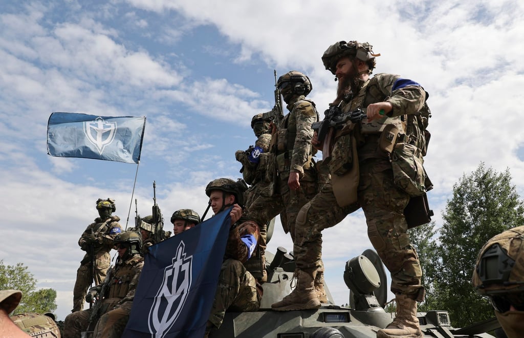 Members of the Russian Volunteer Corps and Freedom of Russia Legion hold a meeting with the media not far from the Ukraine-Russia border on Wednesday. Photo: EPA-EFE Members of the Russian Volunteer Corps and Freedom of Russia Legion hold a meeting with the media not far from the Ukraine-Russia border on Wednesday. Photo: EPA-EFE