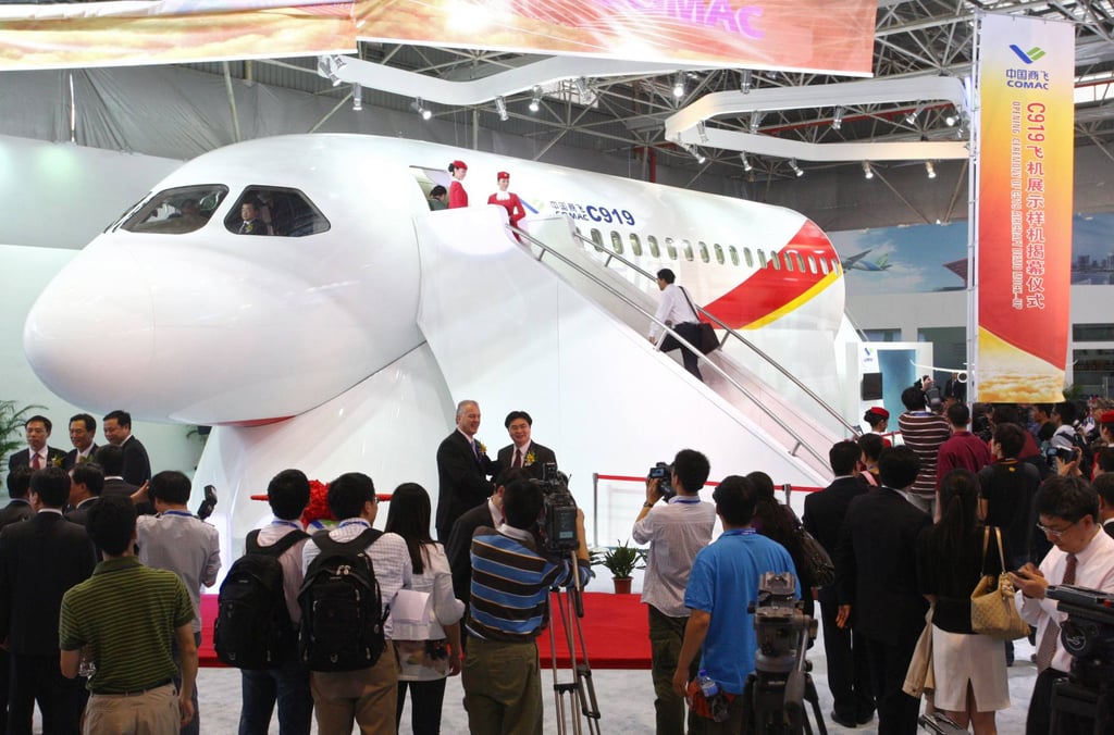 Visitors inspect the C919 prototype at an aviation exhibition during the Zhuhai air show in November 2010. Photo: AFP Visitors inspect the C919 prototype at an aviation exhibition during the Zhuhai air show in November 2010. Photo: AFP