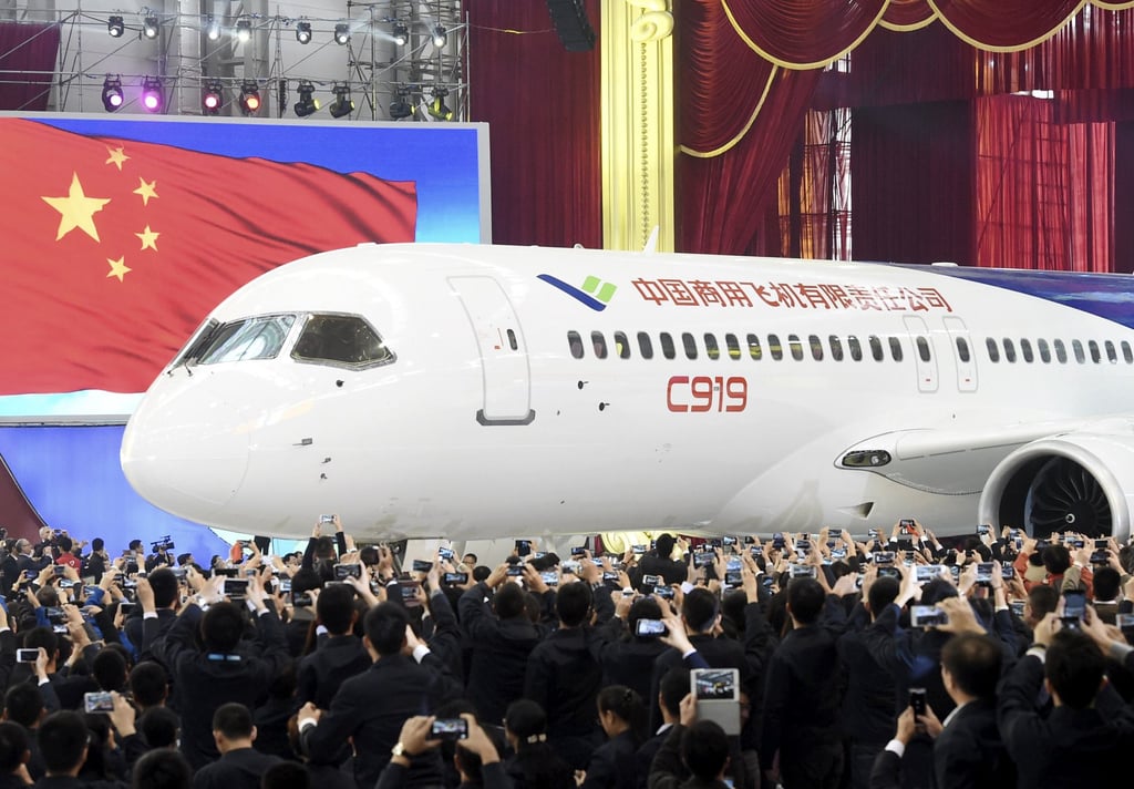 The first C919 passenger jet made by the Commercial Aircraft Corporation of China is pulled out during a news conference in November 2015. Photo: Reuters The first C919 passenger jet made by the Commercial Aircraft Corporation of China is pulled out during a news conference in November 2015. Photo: Reuters