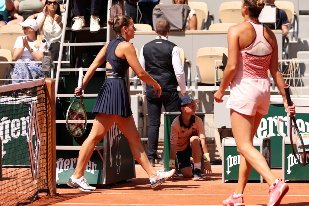 Marta Kostyuk of Ukraine walks past Aryna Sabalenka after their women’s singles match in Paris. Photo: Getty Images