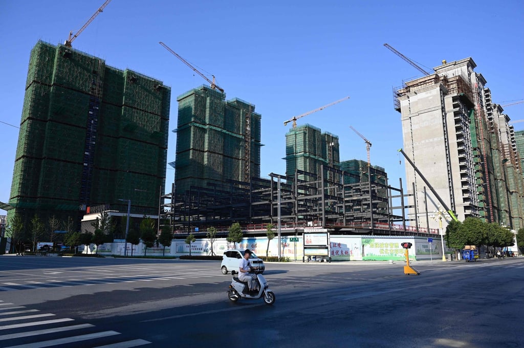 A file photo taken on September 14, 2021 shows the construction site of an Evergrande housing complex in Zhumadian, in central China’s Henan province. Photo: AFP A file photo taken on September 14, 2021 shows the construction site of an Evergrande housing complex in Zhumadian, in central China’s Henan province. Photo: AFP