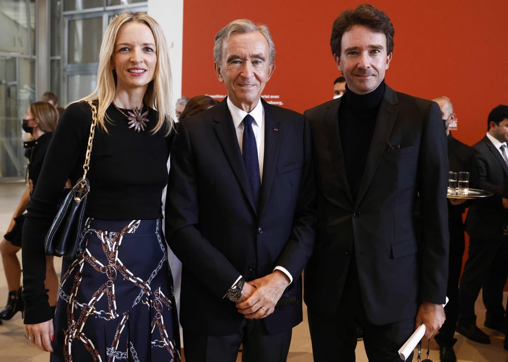 Head of LVMH luxury group, Bernard Arnault (centre), his daughter Louis Vuitton executive vice-president Delphine Arnault (left) and his son LVMH communications head Antoine Arnault (right) arrive to open the exhibition of The Morozov Collection, Icons of Modern Art at Fondation Louis Vuitton in Paris, in September 2021. Photo: AFP Head of LVMH luxury group, Bernard Arnault (centre), his daughter Louis Vuitton executive vice-president Delphine Arnault (left) and his son LVMH communications head Antoine Arnault (right) arrive to open the exhibition of The Morozov Collection, Icons of Modern Art at Fondation Louis Vuitton in Paris, in September 2021. Photo: AFP
