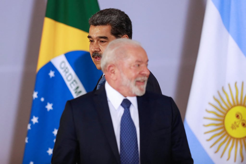 Venezuela’s President Nicolas Maduro walks behind Brazil’s President Luiz Inacio Lula da Silva during the South American Summit at Itamaraty Palace in Brasilia on Tuesday. Photo: Reuters Venezuela’s President Nicolas Maduro walks behind Brazil’s President Luiz Inacio Lula da Silva during the South American Summit at Itamaraty Palace in Brasilia on Tuesday. Photo: Reuters