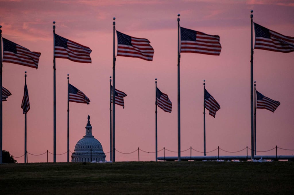 The US Capitol building is seen as the sun rises in Washington on Sunday. President Joe Biden and Republican leader Kevin McCarthy announced a deal on Saturday to raise the debt ceiling, dragging the United States back from the precipice of default with only a few days to spare. Photo: AFP