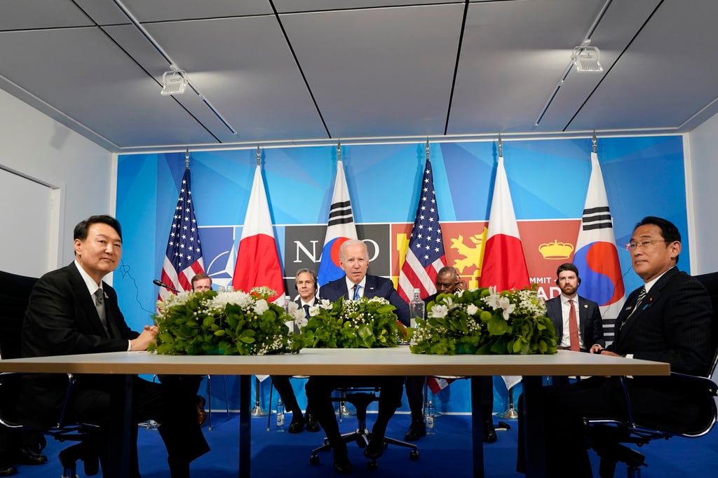US President Joe Biden (middle) meets South Korea’s President Yoon Suk-yeol (left) and Japan’s Prime Minister Fumio Kishida (right) during the Nato summit in Madrid on June 29, 2022. Photo: AP US President Joe Biden (middle) meets South Korea’s President Yoon Suk-yeol (left) and Japan’s Prime Minister Fumio Kishida (right) during the Nato summit in Madrid on June 29, 2022. Photo: AP