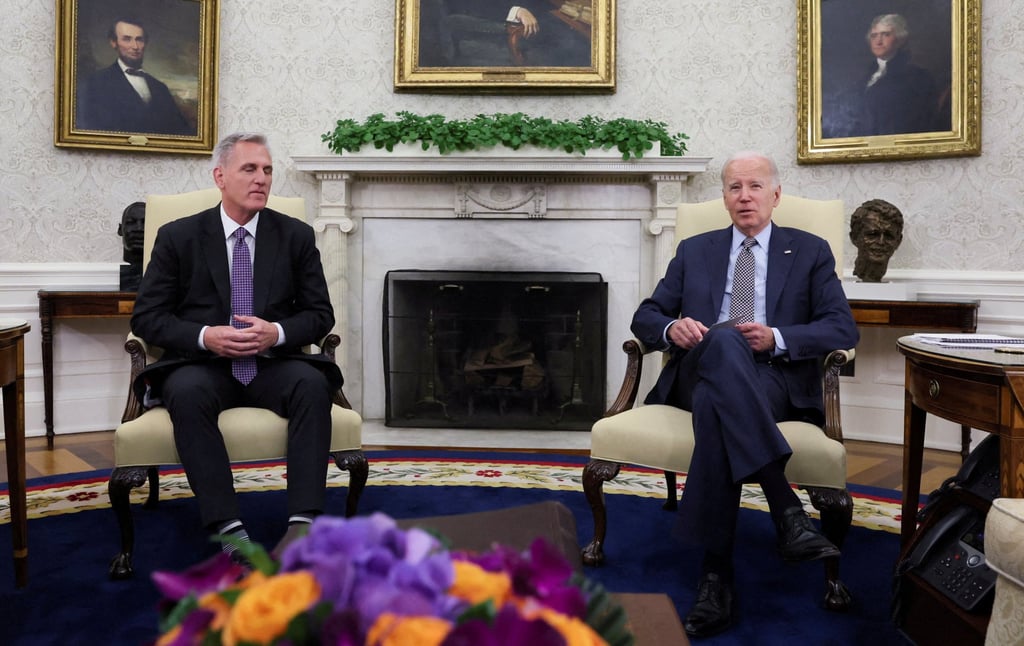 House Speaker Kevin McCarthy, left, sits for debt limit talks with US President Joe Biden in the Oval Office at the White House in Washington on May 22. Photo: Reuters