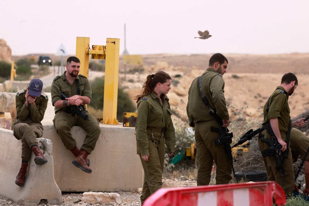 Israeli soldiers outside the Mount Harif military base near the city of Mitzpe Ramon in Israel’s southern Negev desert, near the border with Egypt, on Saturday. Photo: AFP