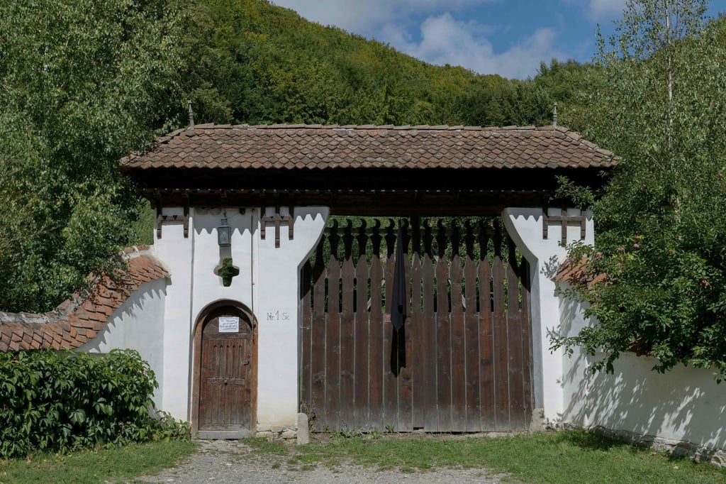 A black veil hangs on the main entrance of the cottage owned by King Charles in the village of Valea Zalanului, in Transylvania, central Romania. Photo: AFP