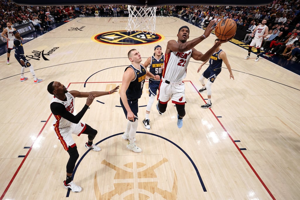Miami Heat forward Jimmy Butler (centre) shoots the ball during Game 2 of the 2023 NBA Finals. Photo: USA Today Sports Miami Heat forward Jimmy Butler (centre) shoots the ball during Game 2 of the 2023 NBA Finals. Photo: USA Today Sports