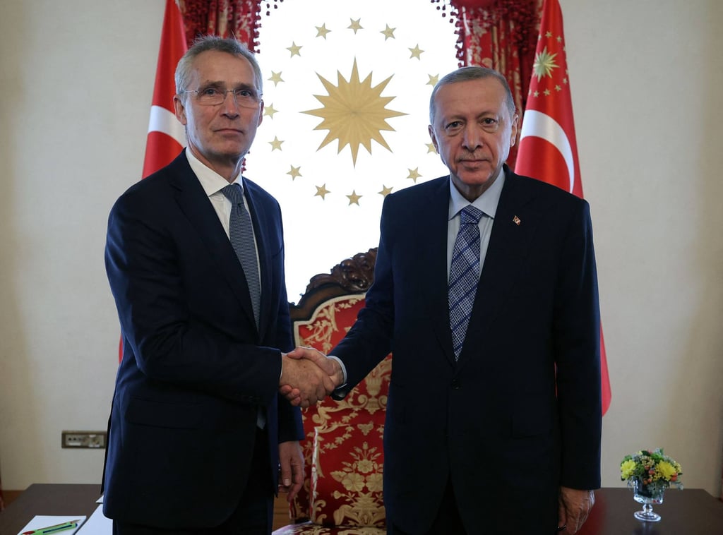 Turkish President Recep Tayyip Erdogan, right, shakes hands with Nato Secretary General Jens Stoltenberg at the Dolmabahce Office in Istanbul, Turkey on Sunday. Photo: Press Office of the Presidency of Turkey / AFP / Handout