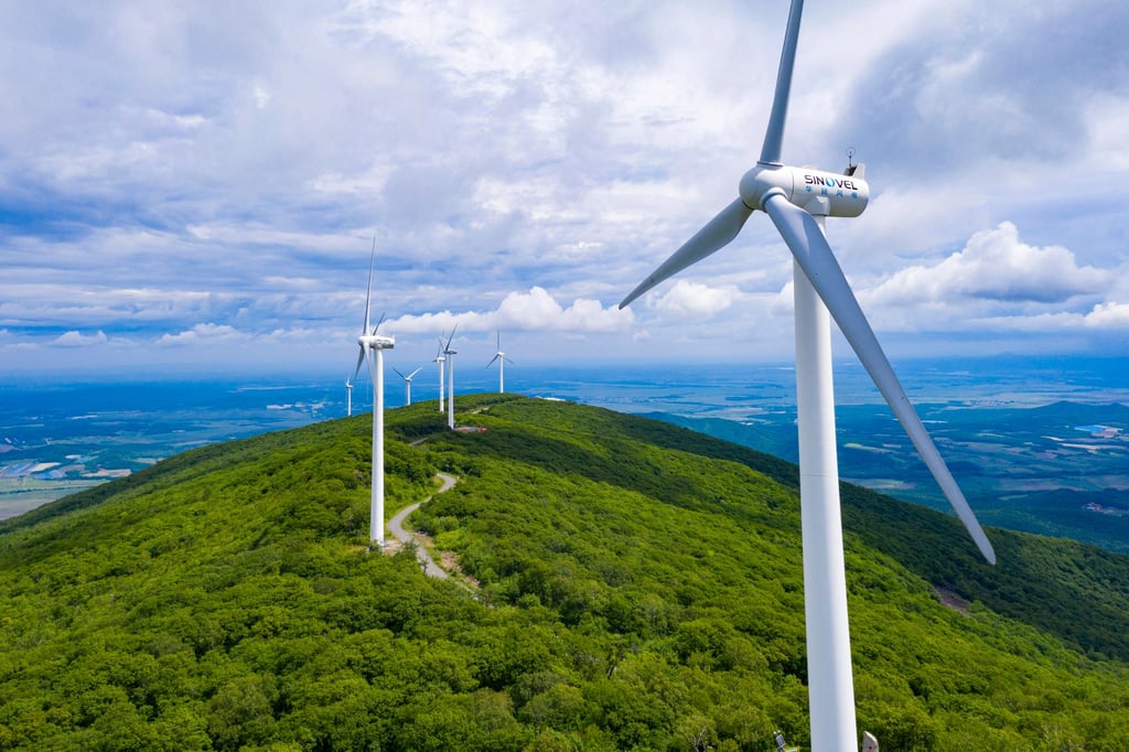 An aerial photo taken on June 19, 2022 shows wind turbines in Dadingzi Mountain Forest Park in Raohe County, in northeast China’s Heilongjiang Province. Photo: Xinhua