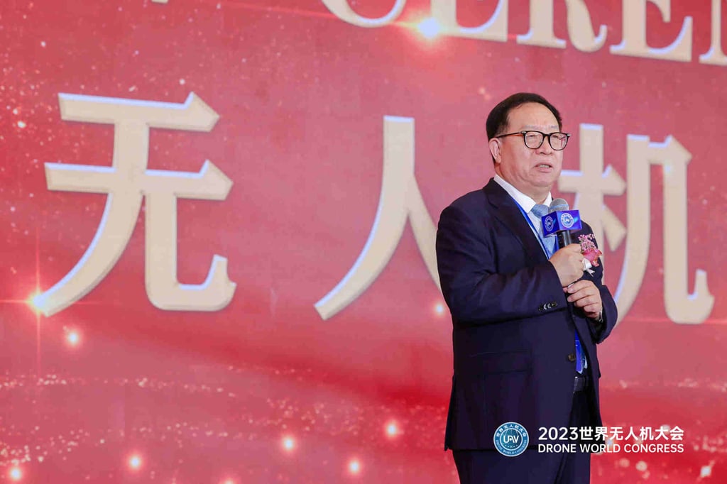 Yang Jincai, chairman of the Shenzhen Unmanned Aerial Vehicle Industry Association, presents the latest domestic market data at the 7th Drone World Congress that was held from June 2 to 4, 2023, in Shenzhen. Photo: SCMP