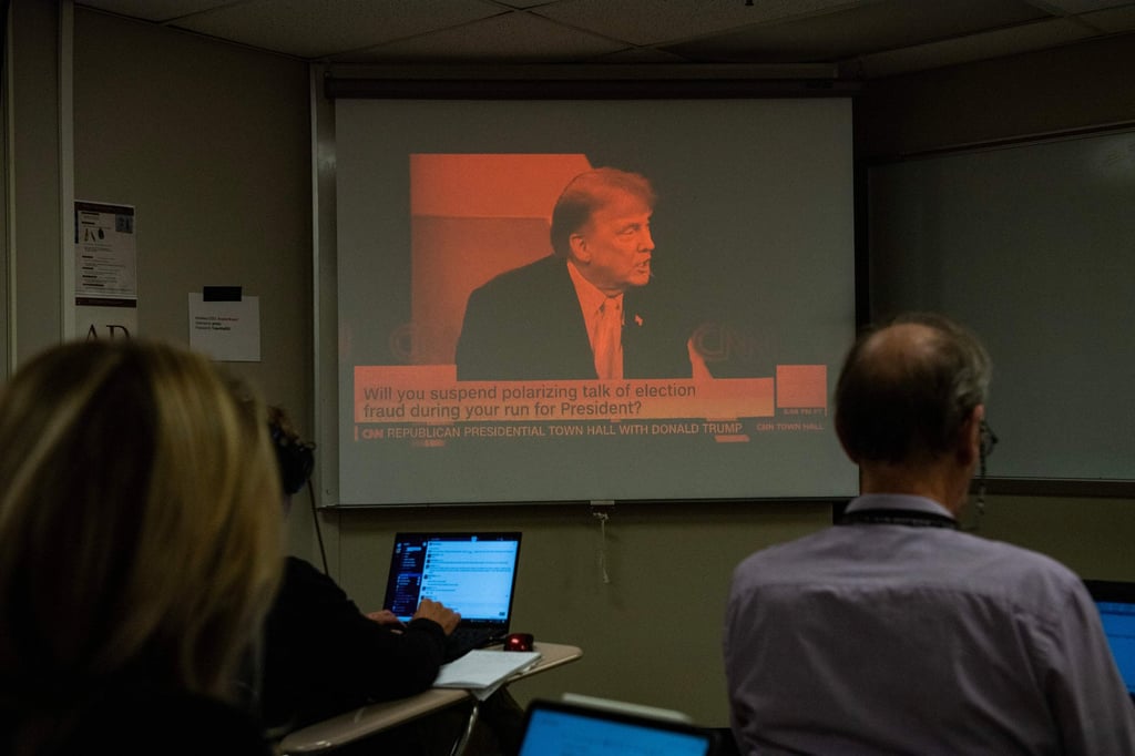Reporters watch a CNN town hall with former US president Donald Trump in New Hampshire in May. Photo: AFP/TNS