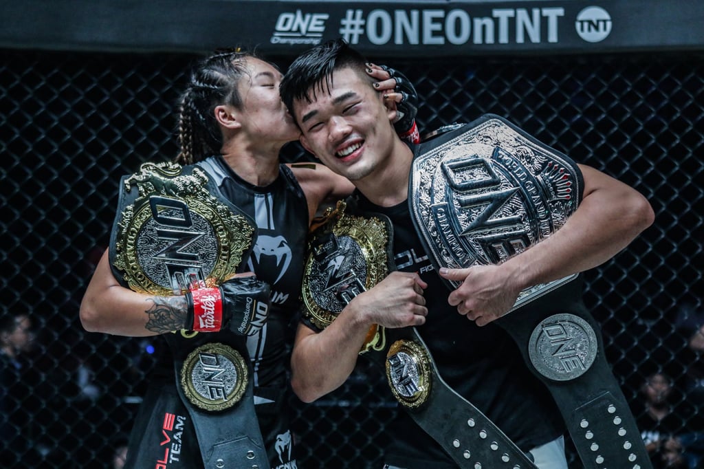 Angela Lee kisses her brother Christian Lee at Century Part 1 in Tokyo. Photo: ONE Championship Angela Lee kisses her brother Christian Lee at Century Part 1 in Tokyo. Photo: ONE Championship