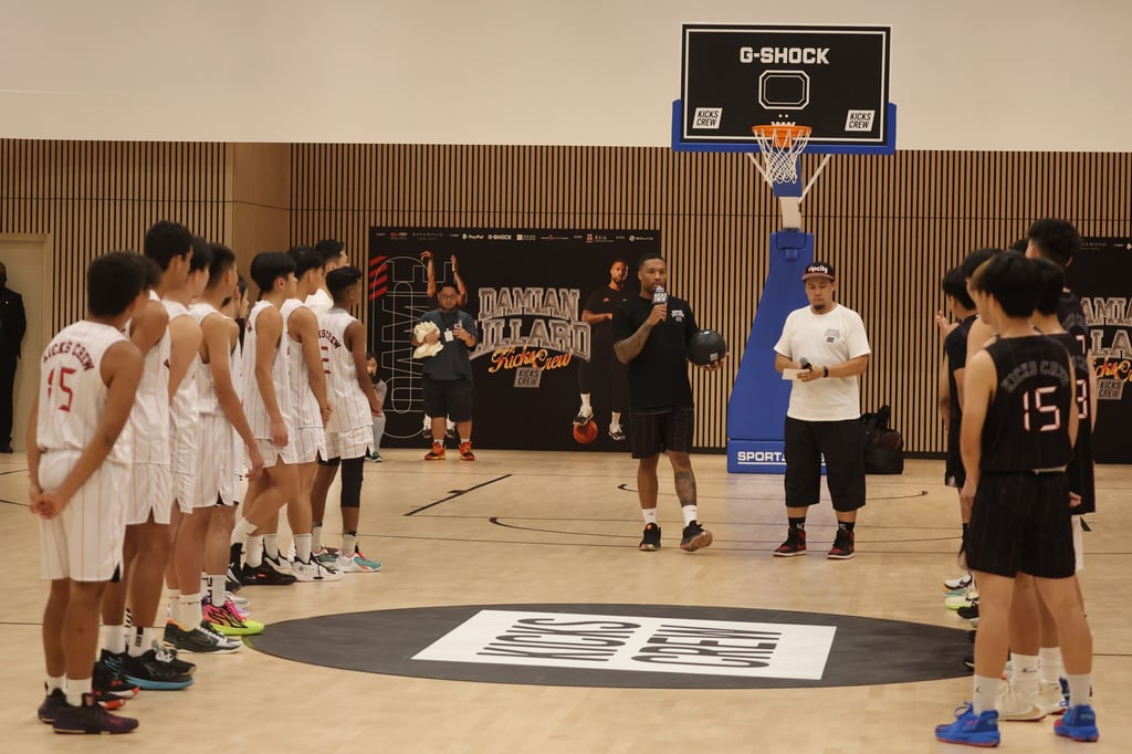 NBA player Damian Lillard speaks during a community event with local youths in San Po Kong. Photo: Edmond So