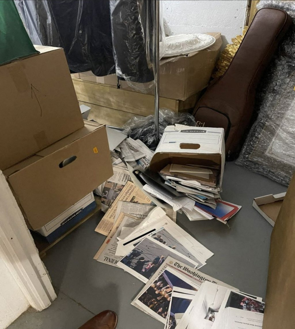 An undated image attached as evidence in the indictment against former US president Donald Trump shows the contents of a box containing classified material found by Walt Nauta in a storage room allegedly at Mar-a-Lago. Photo: US Department of Justice via AFP