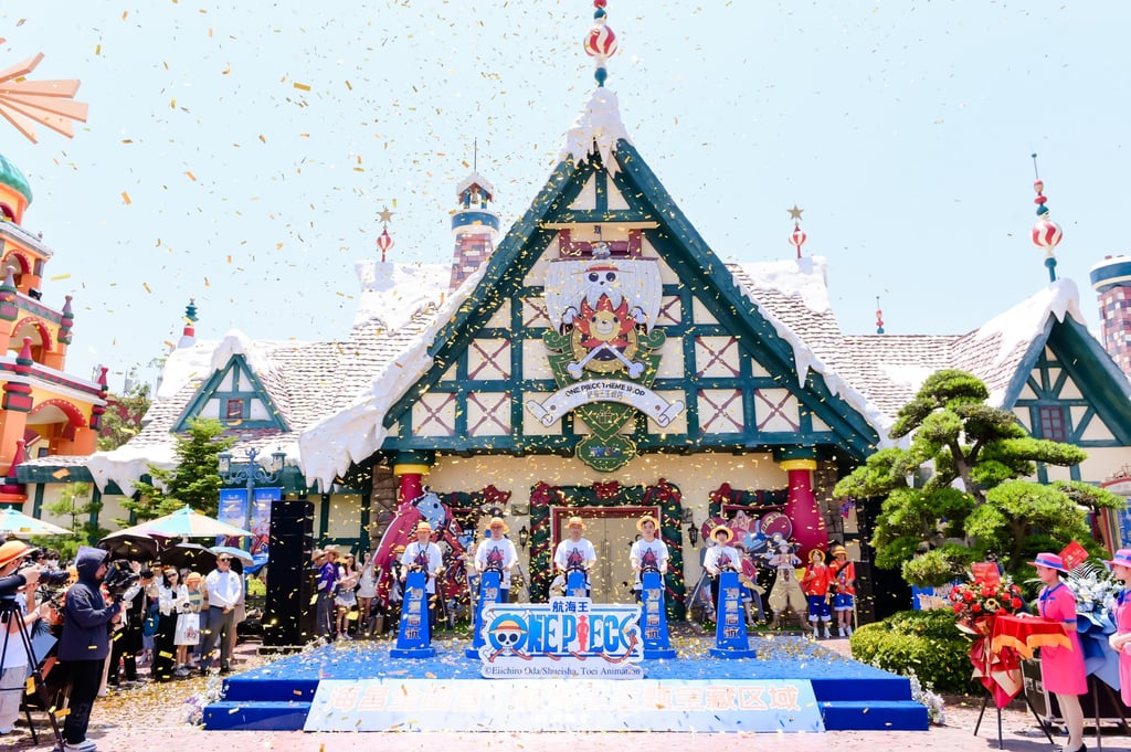 Pudong government officials and Haichang executives celebrate the launch of a One Piece-themed venue at the Shanghai Haichang Ocean Park. Photo: Handout