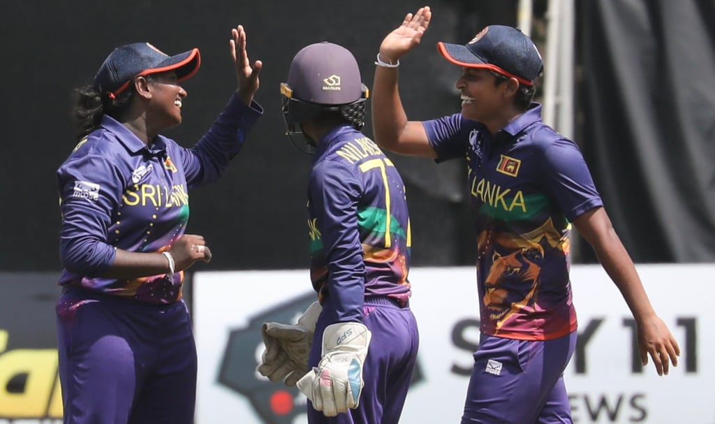 Nilakshana Sandamini (centre) celebrates with Umasha Thimeshani (left) and Malsha Shehani. Photo: Xiaomei Chen
