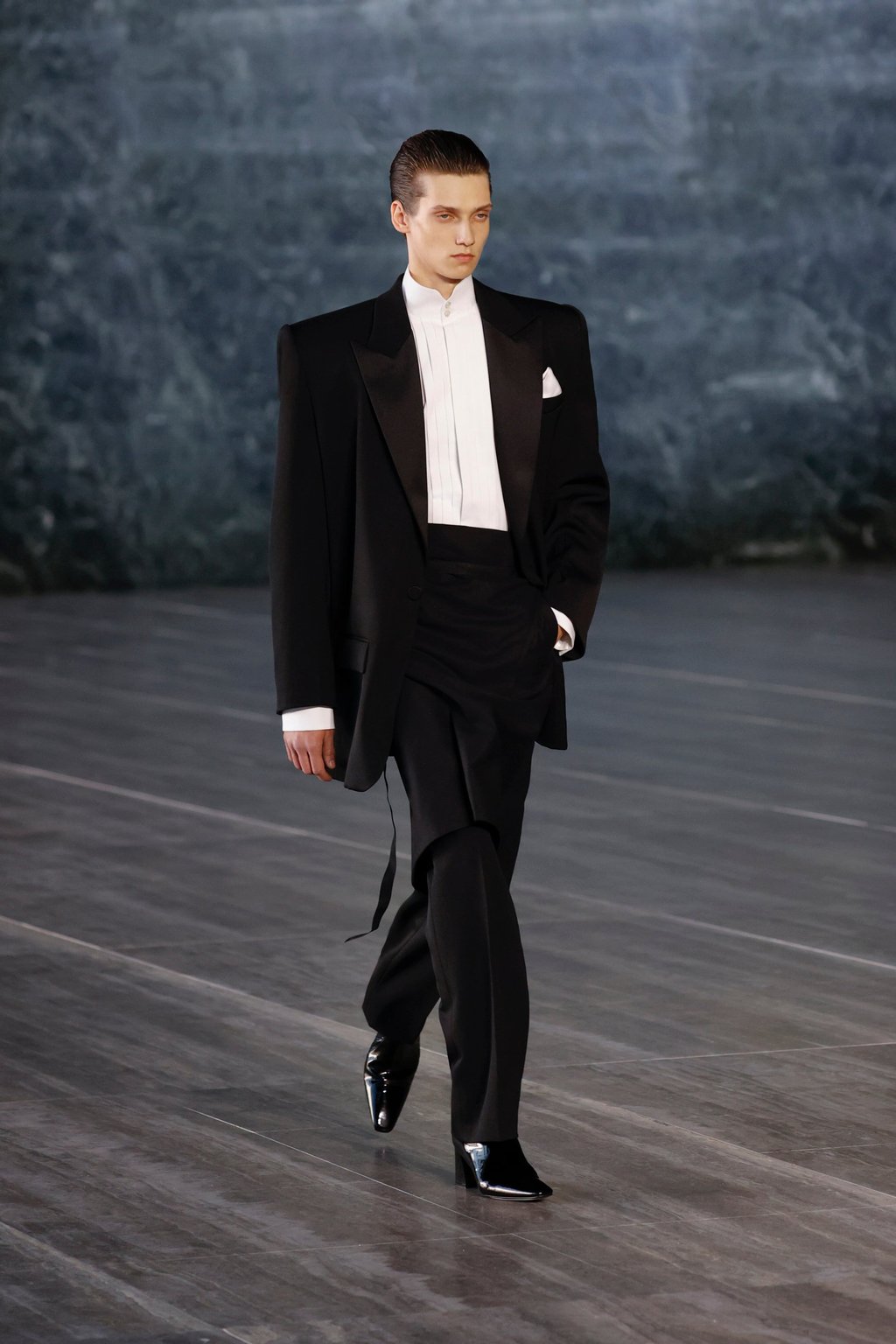 A chic suit is part of Saint Laurent’s take on “quiet luxury” for its summer 2024 men’s show held in Berlin, on June 12. Photo: Handout