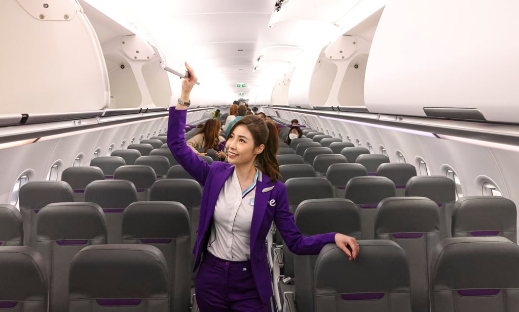 A HK Express flight attendant looks around the airline’s first Airbus A321neo aircraft that was delivered in March as it anticipates a rebound in aviation demand. Photo: K.Y. Cheng