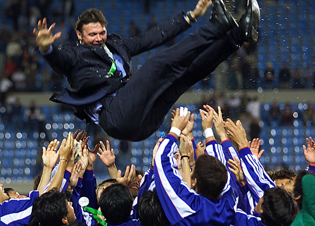 Japan players throw their then coach Philippe Troussier in the air after winning the 2000 Asian Cup. Photo: Reuters Japan players throw their then coach Philippe Troussier in the air after winning the 2000 Asian Cup. Photo: Reuters