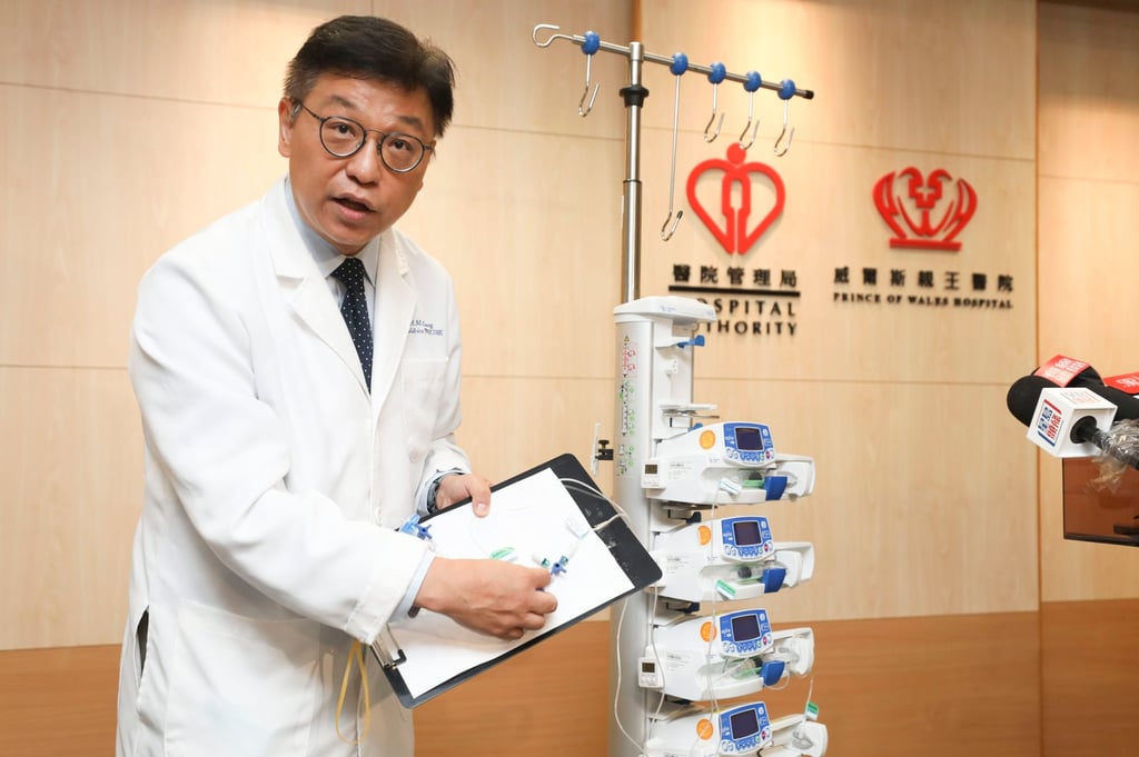 Dr Cheung Hon-ming, the hospital’s deputy chief executive, shows how the medical device used to treat the newborn works. Photo: Xiaomei Chen