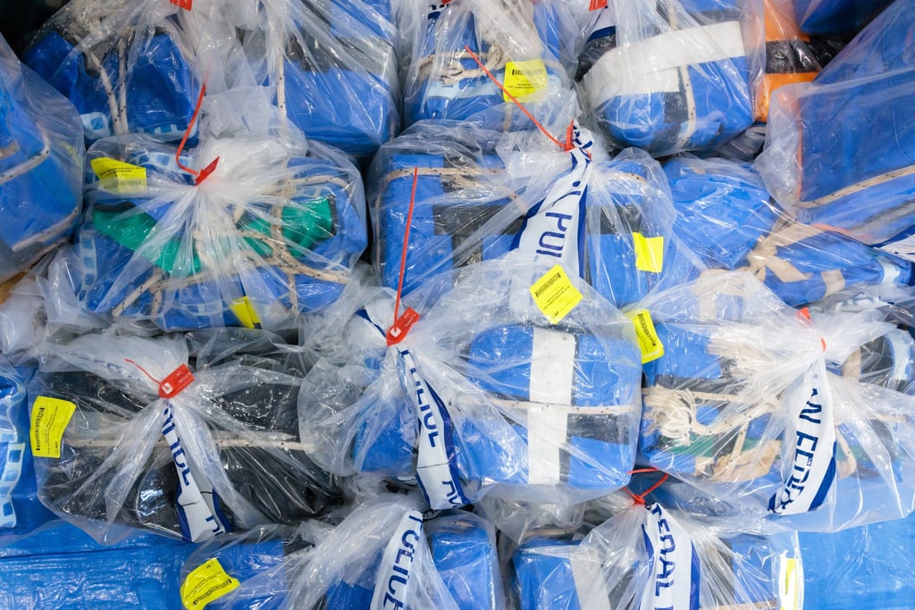 Recently seized cocaine is displayed by the Australian Federal Police earlier this month. Cocaine and meth shipments were found hidden inside plastic pallets and electrical transformers in Hong Kong, Los Angeles, Sydney and New Zealand. Photo: EPA-EFE