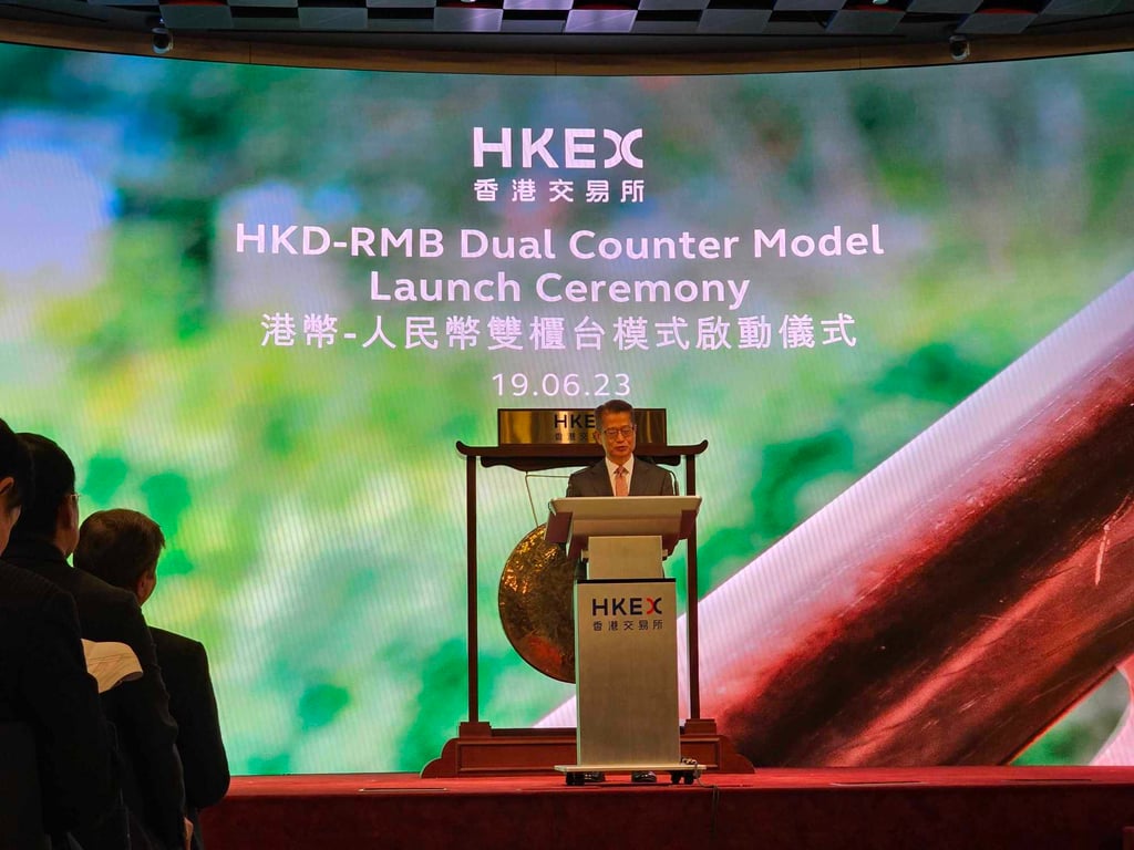 Financial Secretary Paul Chan Mo-po officiating the Dual Counter Model on June 19. Photo: Enoch Yiu Financial Secretary Paul Chan Mo-po officiating the Dual Counter Model on June 19. Photo: Enoch Yiu