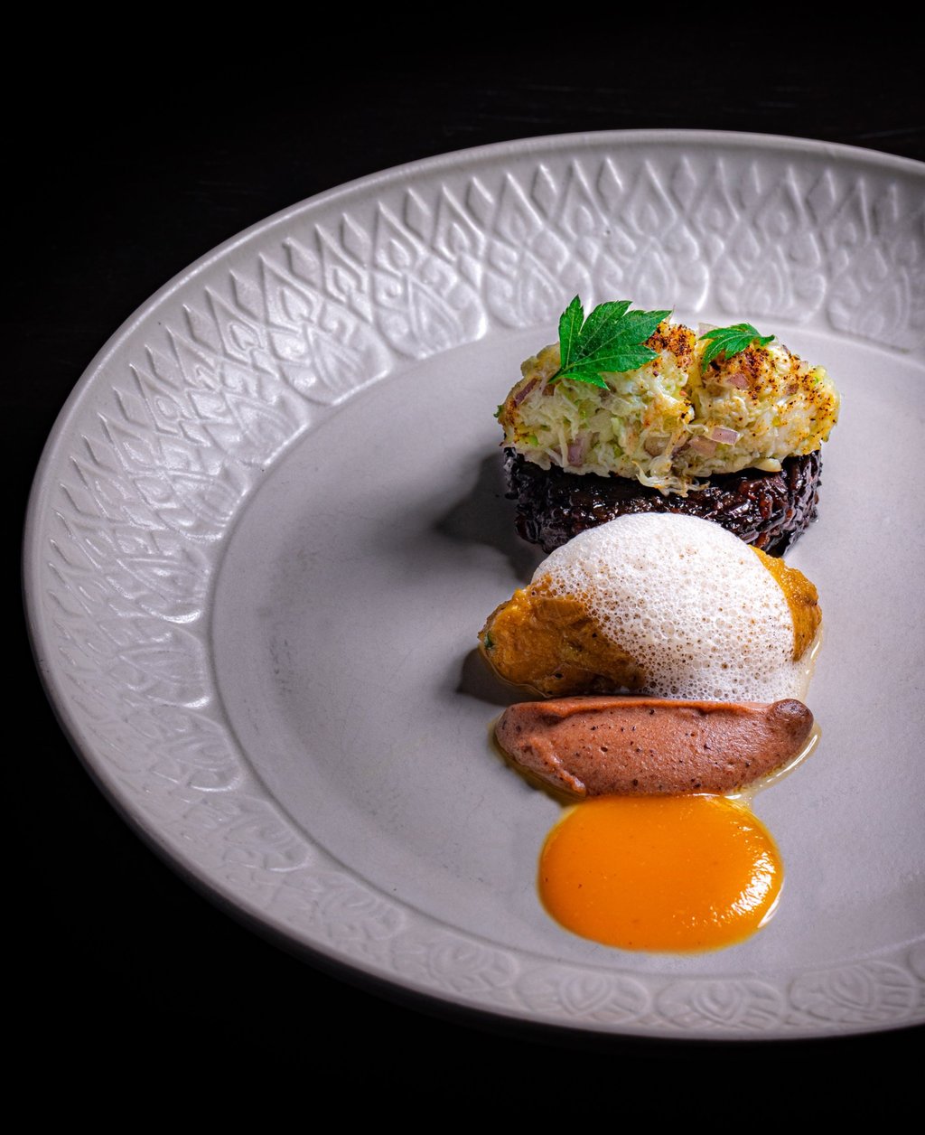 Crab with crab roe, Chinese olive and house-made hot sauce at Niras. Photo: Niras Crab with crab roe, Chinese olive and house-made hot sauce at Niras. Photo: Niras