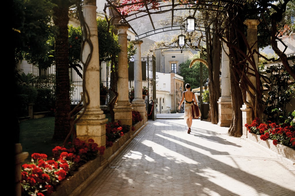 The entrance of the Grand Hotel Timeo, A Belmond Hotel, Taormina looking onto Via Teatro Greco. Photo: Belmond