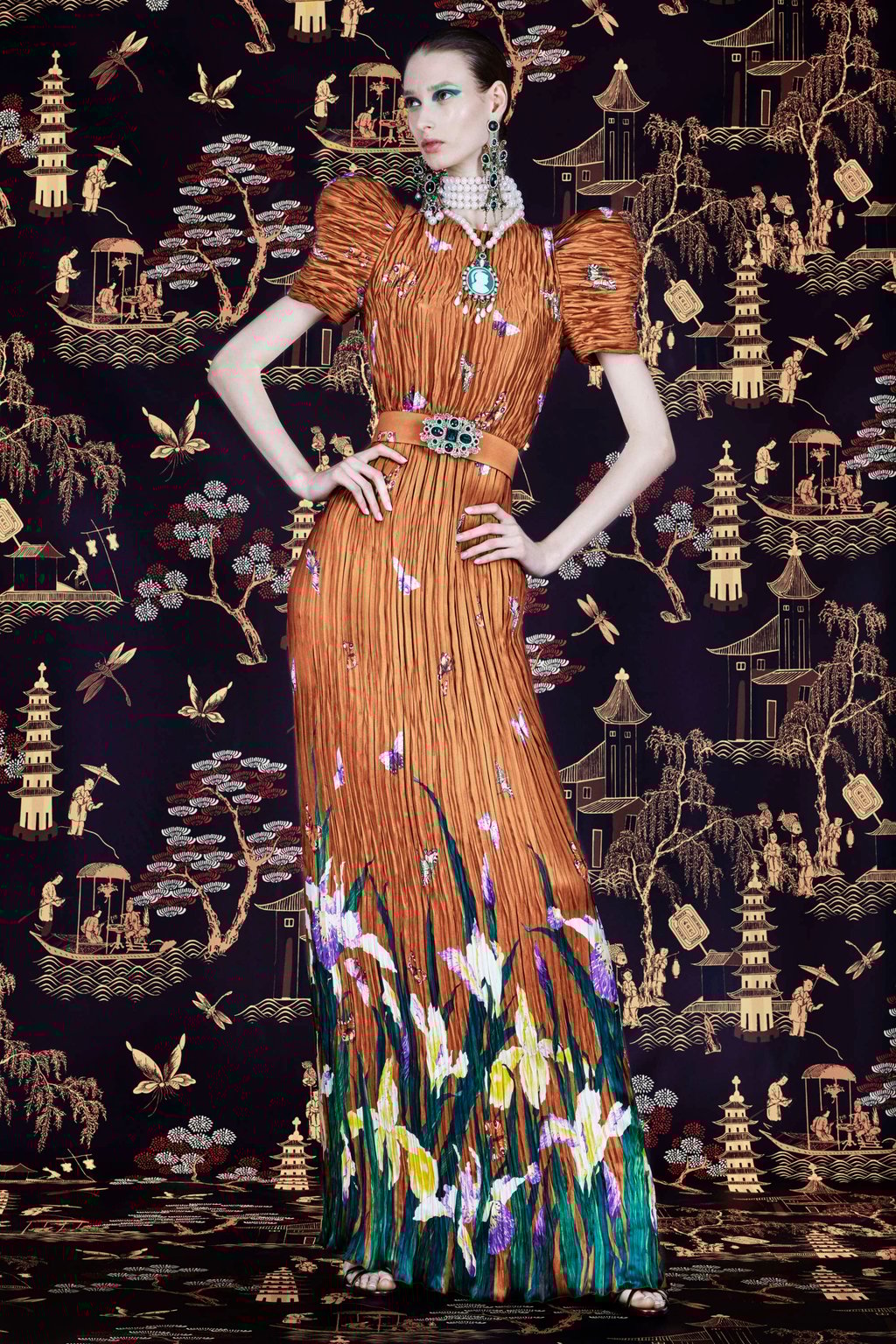 Andrew Gn’s hand-pleated silk satin column dress with iris print, pleated sculpted sleeves and a jewel belt. Photo: Handout