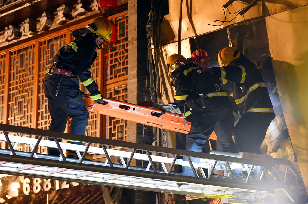 Firefighters work to rescue victims of a blast on Wednesday night in a restaurant in Ningxia that has taken 31 lives. Photo: Xinhua Firefighters work to rescue victims of a blast on Wednesday night in a restaurant in Ningxia that has taken 31 lives. Photo: Xinhua