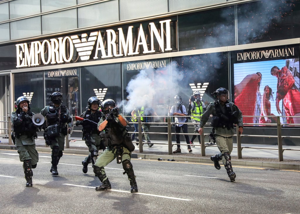 Riot police carry out a dispersal operation against protesters in Central in 2019. Photo: May Tse Riot police carry out a dispersal operation against protesters in Central in 2019. Photo: May Tse