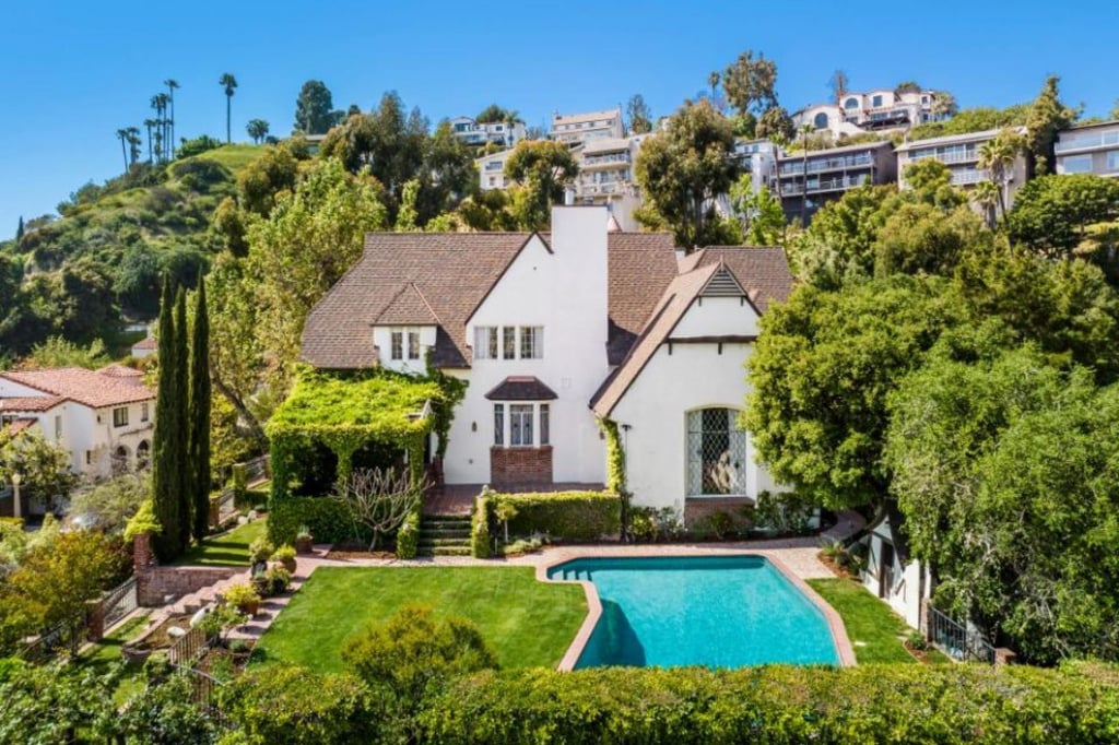 The landscaped grounds include a pool, walking paths and lush gardens. Photo: TheLuxLevel The landscaped grounds include a pool, walking paths and lush gardens. Photo: TheLuxLevel