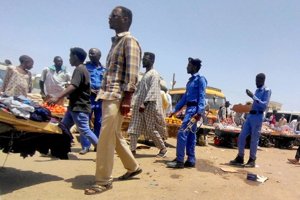Sudanese police patrol the main market of Wad Medani, 200km south of Khartoum, on Saturday. Photo: AFP