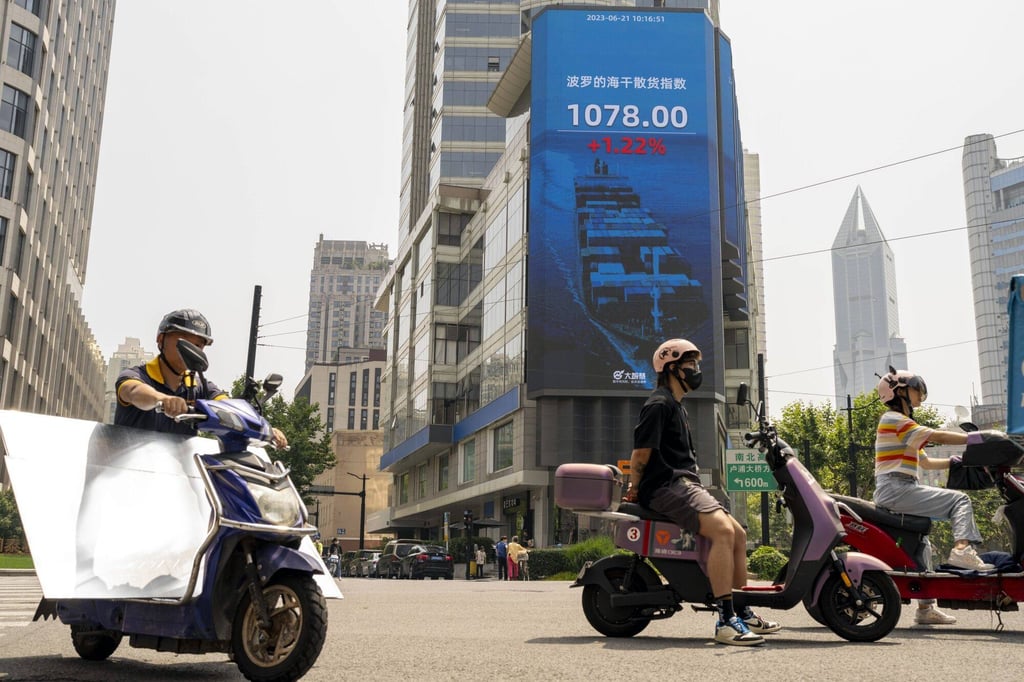 A public screen displaying stock figures in Pudong’s Lujiazui Financial District in Shanghai, China. Photo: Bloomberg